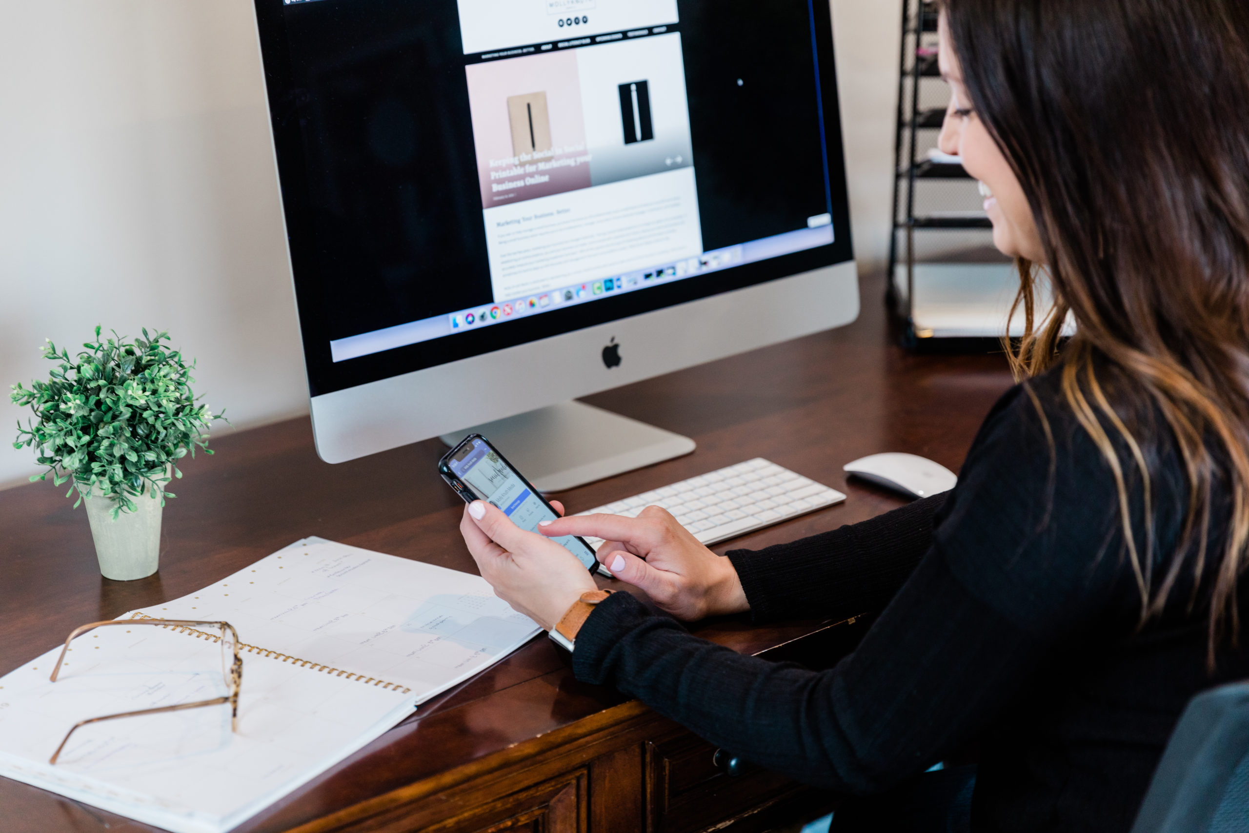 Woman navigating social media in iphone