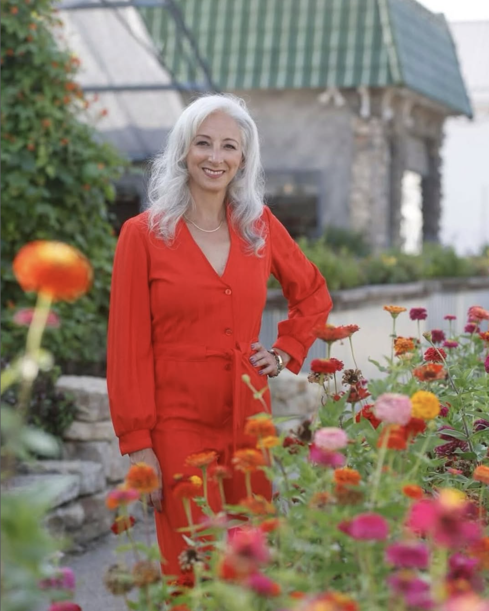 founder Leslie Shalabi stands in front of Convivium Urban Farmstead